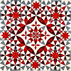 a red and white geometric design with stars on the center is shown in this image