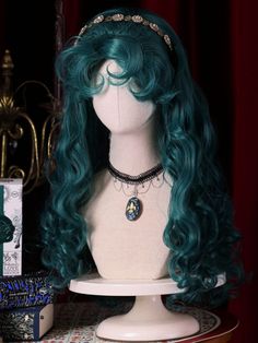 Embrace a touch of vintage glamour with this stunning malachite green wig. Designed with long, luxurious curls and stylish bangs, this wig is the perfect accessory for your Halloween costume. Its rich, bold color and elegant waves create a lavish, retro look that will turn heads at any event.  Please note that the price includes one wig only.   	 		 			Size 			Free Size 		 		 			Length 			65 Anika Core, Green Curly Hair, Hair Claims, Stylish Bangs, Two Ponytails, Green Halloween, Cottagecore Vibes, Dramatic Hair, Malachite Green