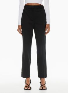 Elevate your workwear wardrobe with these stunning Babaton Atelier dress pants. The solid black color and classic theme make them a versatile addition to any outfit. The pants feature a zip and hook & loop closure, button and zipper accents, and pockets for added functionality. Made from a blend of polyester, spandex, and cotton, these straight-legged pants offer a regular fit and a high rise waist of 35 inches. With a flat front design and a 29-inch inseam, these pants are perfect for both business and formal occasions. Add these NWT pants to your collection today! New With Tags MEASUREMENTS TAKEN WITH ITEM LAYING FLAT ON TABLE Waist 17.5 Rise 12 Inseam 29 Smoke Free Environment SHIPS NEXT DAY OFFERS WELCOME 0368BH Atelier Dress, Melina Pant, Olive Skirt, Denim Vans, Denim Short Dresses, Classic Theme, Sweater Blouse, Straight Leg Pants, Dress Pants