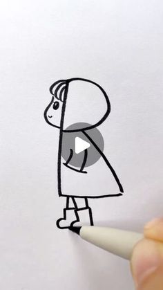 someone is drawing a cartoon character on paper with a marker and pencil, while the image appears to be in full color