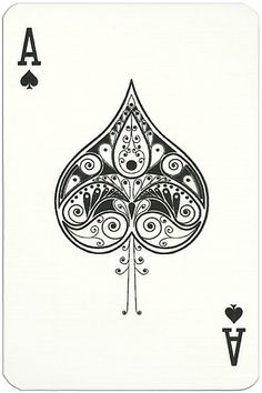 a playing card with an intricate design on the front and back side, in black ink