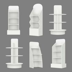 a set of white shelves with different shapes and sizes for display purposes, on a gray background