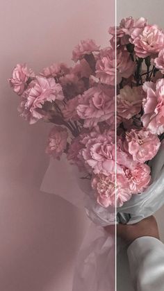 pink flowers are in a vase on the left and right side of the image, with one being held up by someone's hand