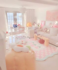 a living room filled with lots of white furniture and pink accessories on the floor,