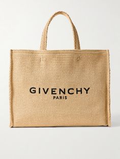 Woven from durable yet lightweight raffia, Givenchy's tote is perfect for trips to the beach. It's embroidered with the label's logo in black threads the front and has plenty of space inside to comfortably fit your wallet, water bottle, towel, sunscreen and a tablet. Givenchy Tote Bag, Summer Style Guide, Embroidered Tote Bag, Flat Dress Shoes, Floral Dresses Short, Givenchy Paris, Gucci Eyewear, Media Logo, Givenchy Women