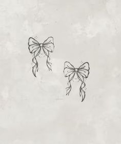 two bows drawn in black ink on white paper