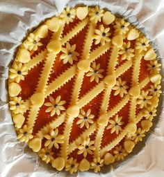 a close up of a pie on wax paper