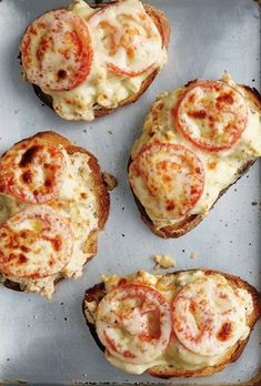 three pieces of bread with cheese and pepperoni on them