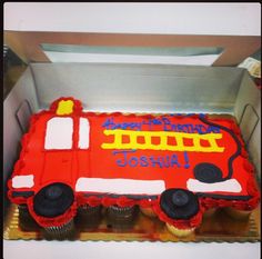 a birthday cake shaped like a fire truck