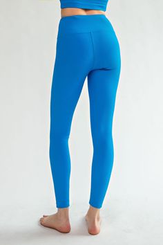 ABOUT These gorgeous Sonic Blue Nylon Rib Yoga Leggings will be your new go-to for any activity! From Yoga to running errands, you'll be feeling comfy and free in this high-waisted, Sonic Blue gem. Plus, you'll look oh-so-gorgeous, so get ready to turn some heads! *Rae Mode is an affordable, popular, premium quality fitness wear brand with a 4.8/5.0 star rating. DETAILS Yoga leggings High waisted Full length Key pockets Buttersoft fabric Compression fabric Flattering fit CARE INSTRUCTIONS Machin Blue Moisture-wicking Nylon Leggings, Blue Nylon Yoga Pants, Blue Nylon Athleisure Yoga Pants, Blue Nylon Yoga Pants For Training, Blue Nylon Yoga Pants Sportswear, Blue Nylon Yoga Pants For Pilates, Blue Nylon Sportswear Yoga Pants, Blue Nylon Sporty Yoga Pants, Blue Tight Go-dry Activewear