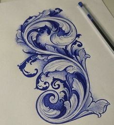 a drawing with blue ink on white paper