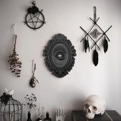 there are many items on the wall in this room, including a skull and other decorations