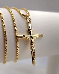 18K Gold Cross Crucifix Pendant Necklace for Men & Women! --- Crafted in GUARANTEED HIGH-QUALITY 18-Karat GOLD -- Pure Gold Material, Not Gold-Filled or Plated -- Total grams weight: 8.92 gr (chain & pendant) Chain Lengths: 22 inches Chain Thickness: 2 millimeter Chain Style: Round box chain - 18K Gold Closer: Lobster claw  * The Pendant is available for sale individually. Please message me for more details! Pendant height: 44 mm Pendant width: 26 mm Style: Cross Crucifix Pendant - 18K Gold  Please feel free to massage me for any costume sizing! * The genuinely handmade Cross charm necklace will make you the center of attention! There is a gift here for everyone on every occasion! * Stamped with "18K" or "750" markings, guaranteeing authenticity and purity. These items will be shipped to y Cross Pendant Men, Cross Charm Necklace, Real Gold Chains, Pendant For Men, Fine Gold Jewelry, 18k Gold Chain, 18k Gold Necklace, Gold Chains For Men, Gold Cross Necklace