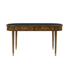 an antique console table with two drawers on one side and gold trimmings on the other