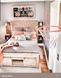 a bedroom with a basketball hoop in the corner