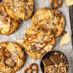 cookies, pretzels and other snacks are on the table