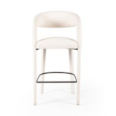 a white chair with a black metal bar stool on it's back and armrests