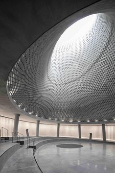 the inside of a building with a circular ceiling