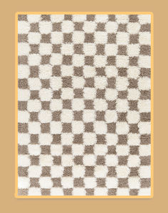 a brown and white checkered area rug