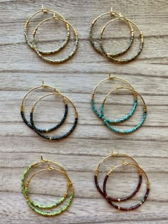 "Available in silver! More colors and styles here: https://www.etsy.com/shop/aMAYSEingDesignCo You choose your Picasso seed bead color on a 14 karat gold plated hoop/wire. * 14 Karat Gold Plated Wires * Premium Glass Miyuki Delica Seed Beads * Approx 1.18\" (30mm) Across Lightweight, dainty, and delicate. Not too big and not too small! Perfect for every occasion or event." Cheap Hoop Earrings With Dangling Beads, Cheap Hoop Earrings With Dangling Beads As Gift, Affordable Hoop Earrings With Dangling Beads, Cheap Trendy Hoop Earrings With Dangling Beads, Cheap Round Earrings With Tiny Beads, Affordable Small Hoop Earrings With Dangling Beads, Cheap Trendy Handmade Hoop Earrings, Affordable Copper Beaded Earrings With Round Beads, Cheap Handmade Trendy Hoop Earrings