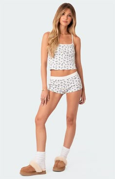 No closet is ever complete without the perfect throw-on shorts. With a comfortable waffle fabric, these shorts will become a staple in your summer wardrobe.Micro shortsElastic waistbandButton front detailFlower-printed waffle fabricCotton, Polyester, SpandexModel wears size SModel height is 5'6Item care: Wash with similar color Edikted Womens Pamper Waffle Micro Shorts - White size Small Cute Pajama, Micro Shorts, Cropped Camisole, Waffle Fabric, Miscellaneous Items, Ootd Ideas, Swimwear Dress