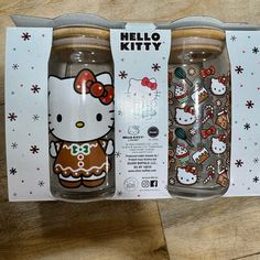 two hello kitty glass cups in the packaging