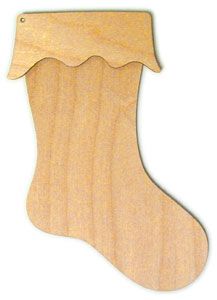 a wooden christmas stocking hanging on a wall