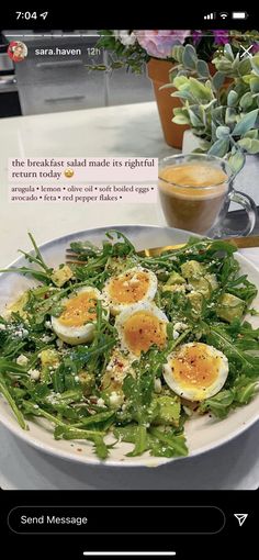 an image of a plate of food with eggs on top and salad in the middle