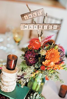 an image of a table setting with flowers and candles on it, which reads hush i'm married