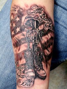 a person with a tattoo on their arm that reads 25 awesome american flag tattoo designs