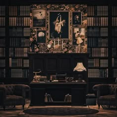 a room with bookshelves, chairs and pictures on the wall