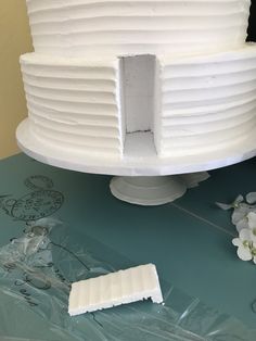 a white cake sitting on top of a table