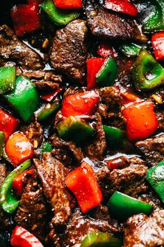 beef and peppers stir frying in a skillet