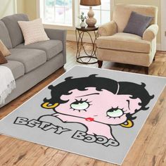 a living room with a couch, chair and rug that says betty bob on it