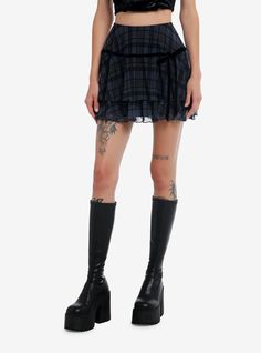 This skirt is pretty but keeps it edgy. It has tiered mesh printed with a black and blue-grey plaid pattern plus black lining and a black velvet ribbon and bow across the hips. Elasticated waistband.95% polyester; 5% spandexWash cold; dry lowLength: 14"ImportedListed in junior sizesModel is 5'10"Model wears size Small Black Velvet Ribbon, Emily The Strange, Suspender Skirt, Grey Plaid, Tier Skirt, Cute Skirts, Velvet Ribbon, Tiered Skirt, Plaid Pattern