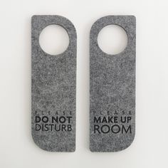 two door hangers that say don't disturb and make up room on them