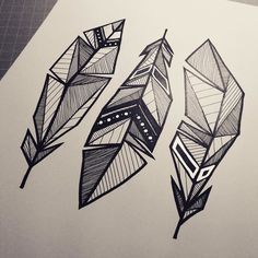 three black and white arrows drawn on paper