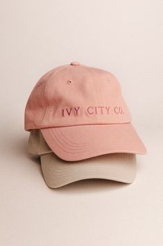 Introducing the first ever Ivy MERCH! We've poured our hearts and souls into these darling hats and hope you love them as much as we do! Available in our signature Ivy pink and a beautiful shade of sage, featuring our classic embroidered logo. And did we mention there's a matching mini version?! Classic Spring Hat With Embroidered Logo, Classic Spring Hats With Embroidered Logo, Spring Baseball Cap With Embroidered Logo And Short Brim, Spring Dad Hat With Embroidered Logo And Flat Brim, Pink Everyday Hat For Spring, Spring Hat With Embroidered Logo And Short Brim, Spring Baseball Cap With Embroidered Logo, Pink Curved Bill Dad Hat For Spring, Curved Brim Hat With Embroidered Logo