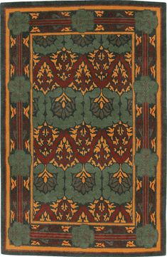 an orange and green rug with many different designs on the border, including leaves and flowers