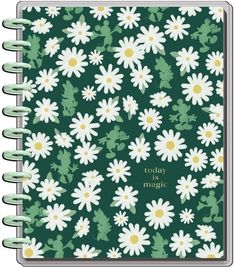 a green notebook with white daisies and the words today is magic on it,