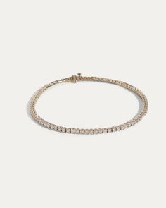 Our KC tennis anklet is a beautiful way to make a statement. Custom made to your ankle size. Shine bright from head to toe. 14K White, Yellow or Rose Gold 9 inch or 10 inch 2.2 mm diamonds (3.8-4.1 carats) G/SI Diamonds Currently not in stock Yellow and Rose gold can take up to 3 weeks to produce. Tennis Anklet, Curve Ring, Diamond Huggies, Big Rings, Solitaire Necklaces, Tennis Necklace, Domed Ring, Classic Ring, Baguette Diamond