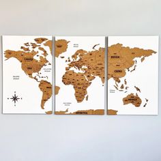 three pieces of wood with the world map on them, each showing different locations and names