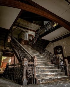 an old building with stairs and railings