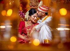 a bride and groom posing for a photo