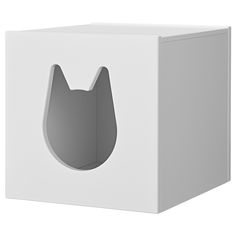 a white box with a cat's head cut out