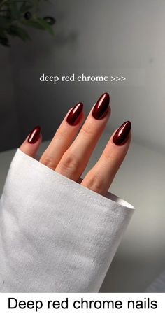 If you want to mix things up, why not try burgundy chrome nails with a matte finish? The combination of a chrome base and a matte top coat creates an interesting contrast between shine and texture. Matte nails have been a popular trend in recent years, offering a more subtle and sophisticated alternative to the typical glossy finish.  To achieve this look, apply a matte top coat over your burgundy chrome nails. This not only reduces the shine but also gives the nails a soft, velvety appearance. Maroon Chrome French Tip Nails, Shiny Burgundy Nails, Nail Burgundy And Gold, Holiday Birthday Nails, Wine Nails Chrome, Dark Red Metallic Nails, Dark Red Velvet Nails, Fall Red Chrome Nails, Wine Colored Nails Acrylic