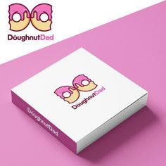 the logo for doughnut dad is displayed on a box