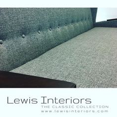 a close up of a couch with buttons on it's back and the words lewis interiors