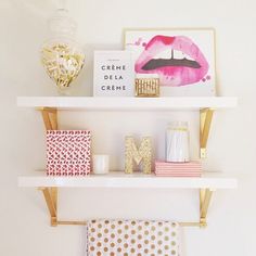 a shelf with some items on top of it and the words mom written in gold