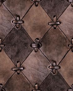 an old leather background with rivets and knots